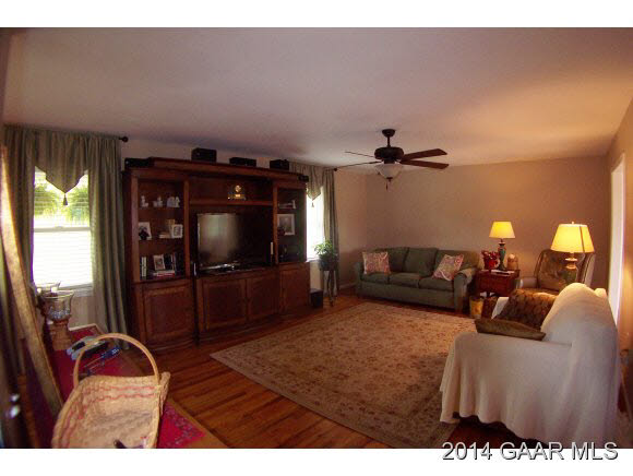 3788 Shutterlee Mill Road Staunton, VA 24401 - Photo 7 of 32 a living room with furniture and a flat screen tv