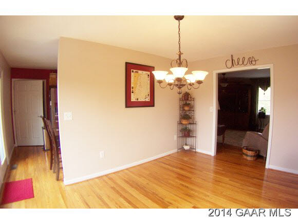 3788 Shutterlee Mill Road Staunton, VA 24401 - Photo 10 of 32 a view of a living room with a chandelier