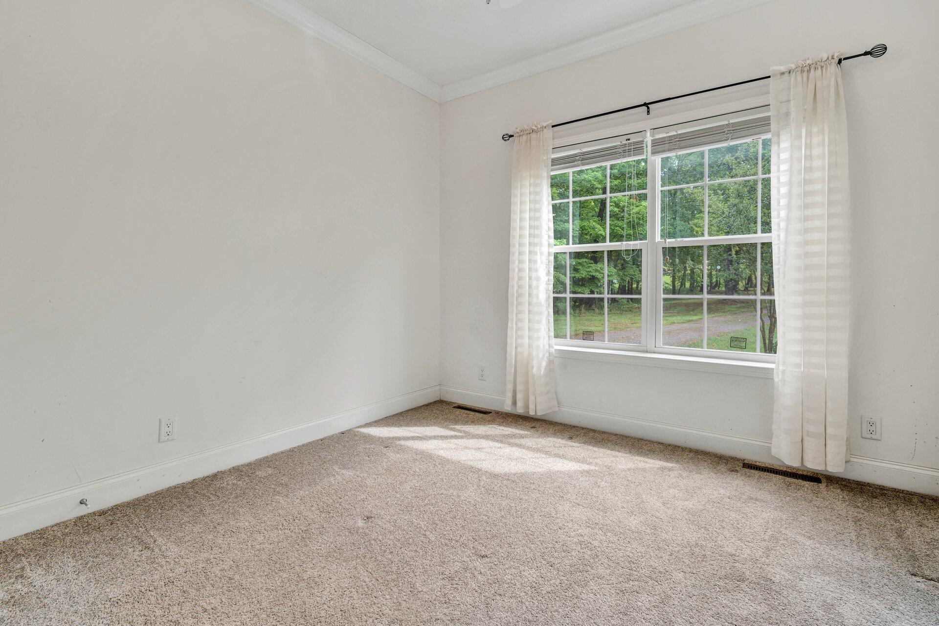 4004 Coopers Cove Road Hardy, VA 24101 - Photo 11 of 32 a view of an empty room with a window