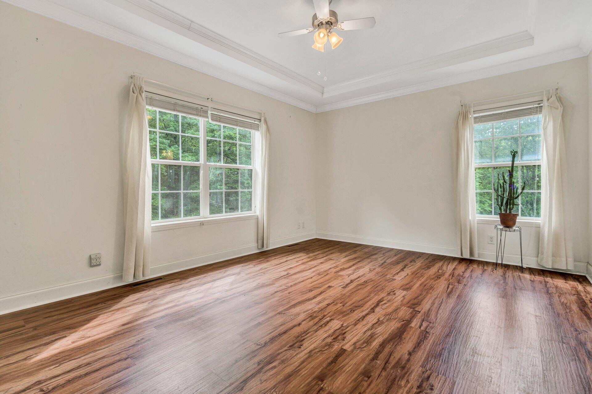 4004 Coopers Cove Road Hardy, VA 24101 - Photo 12 of 32 a view of an empty room with wooden floor and a window