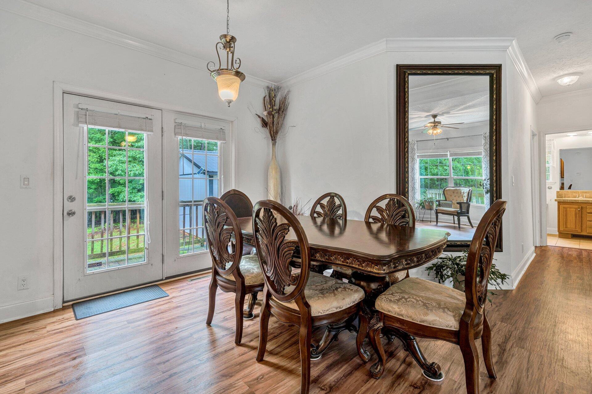 4004 Coopers Cove Road Hardy, VA 24101 - Photo 6 of 32 a view of a dining room with furniture window and wooden floor