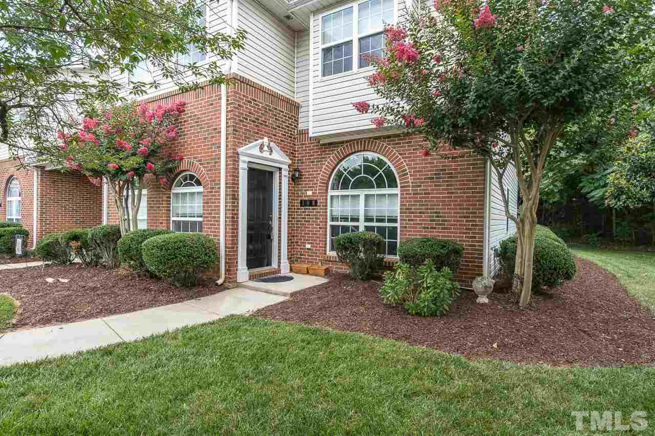2011 Rivergate Road, Unit 106 Raleigh, NC 27614 - Photo 22 of 22 a front view of a house with garden