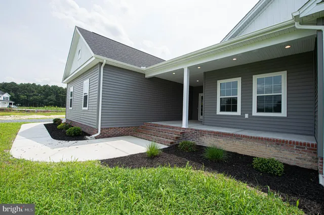 a house view with a garden space