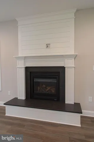 a living room with a fireplace