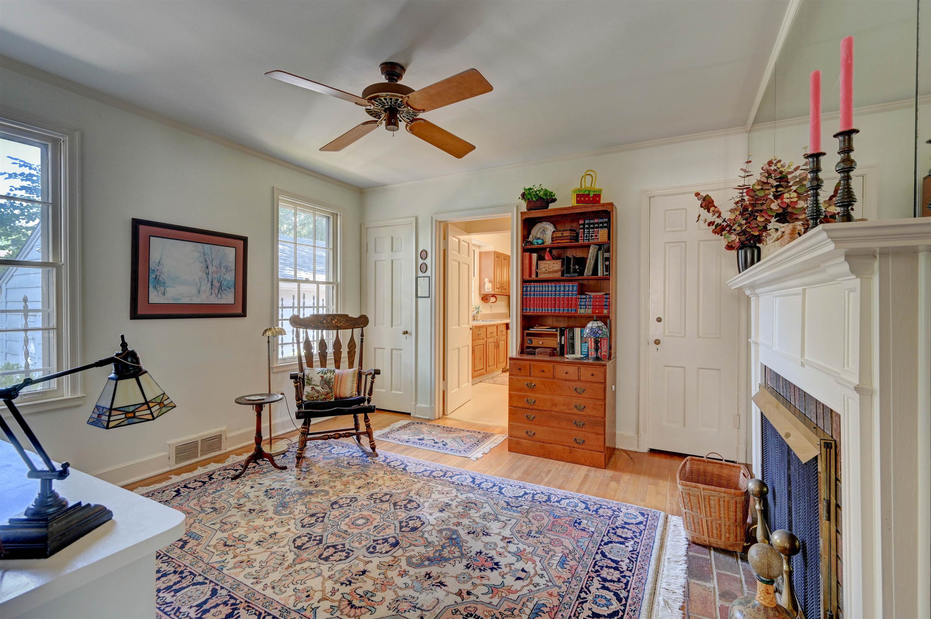 3900 Walnut Grove Road Memphis, TN 38111 - Photo 8 of 25 a living room with furniture and a rug