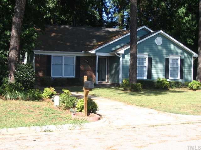 2221 Carthage Circle Raleigh, NC 27604 - Photo 1 of 6 a front view of a house with a yard