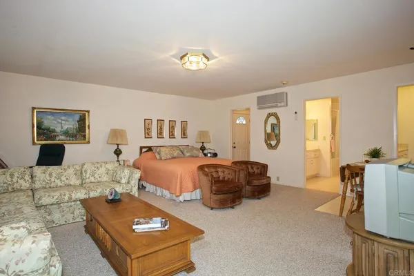 a living room with furniture and a couch