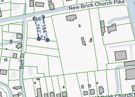 a picture of a door and a white car parked