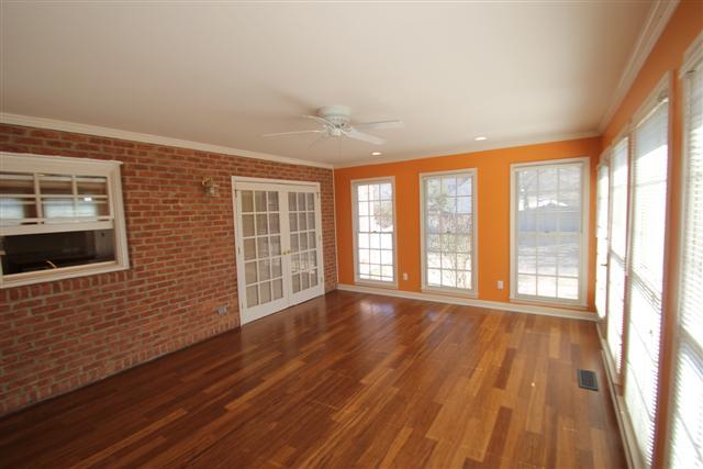 338 Short Springs Road Tullahoma, TN 37388 - Photo 10 of 20 Large Sunroom with Bamboo wood Flooring