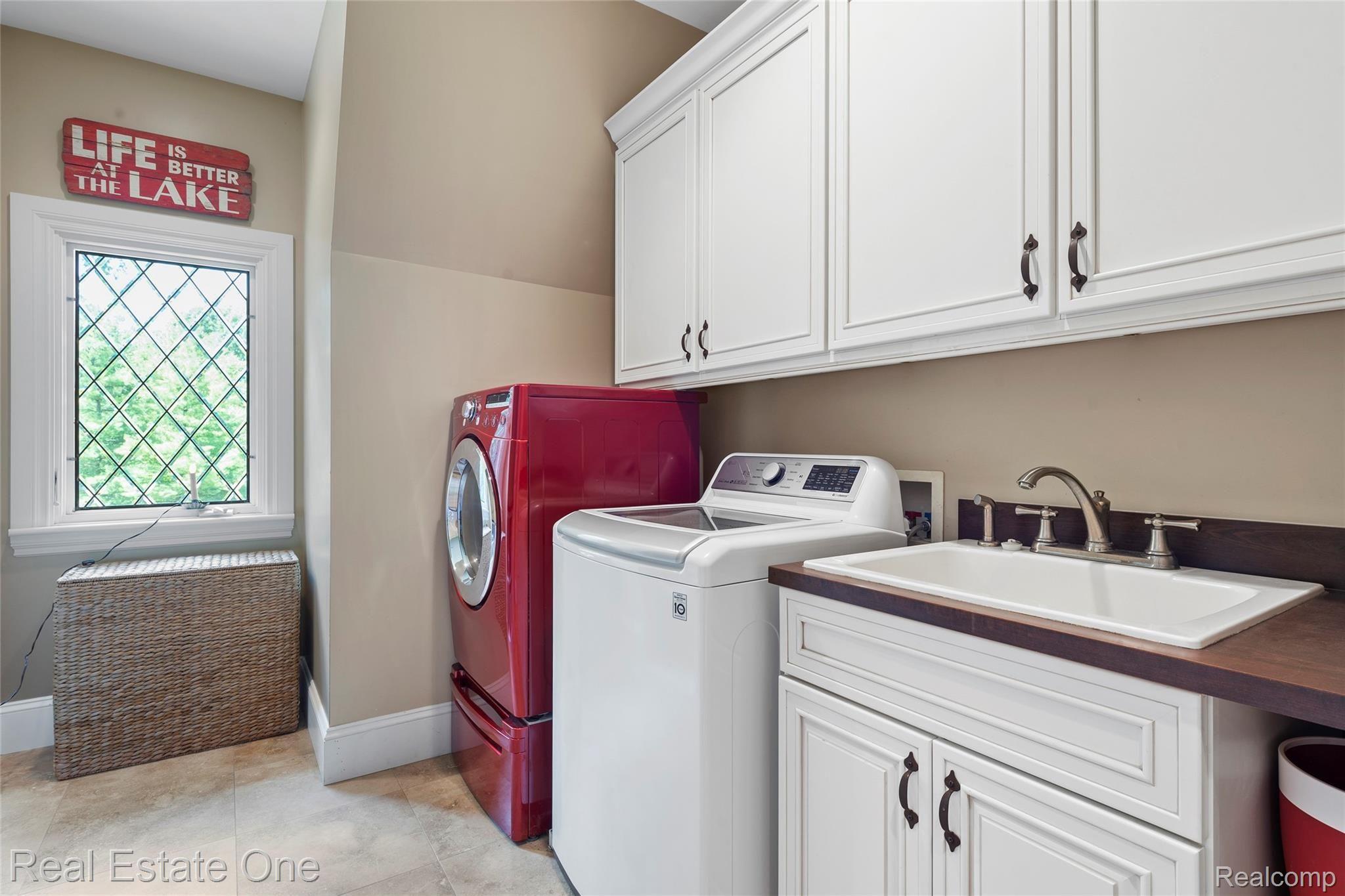 7807 Fieldstone Ridge Clarkston, MI 48348 - Photo 42 of 59 Second Floor Laundry Room, 11 x 9 with ceramic flooring