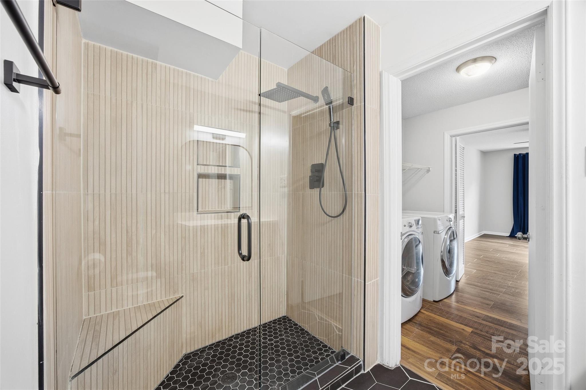 4739 Hedgemore Drive, Unit O Charlotte, NC 28209 - Photo 20 of 25 a bathroom with a shower