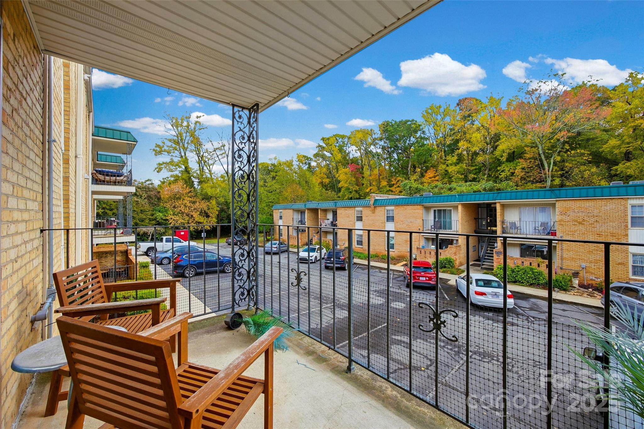 4739 Hedgemore Drive, Unit O Charlotte, NC 28209 - Photo 22 of 25 a view of balcony with furniture