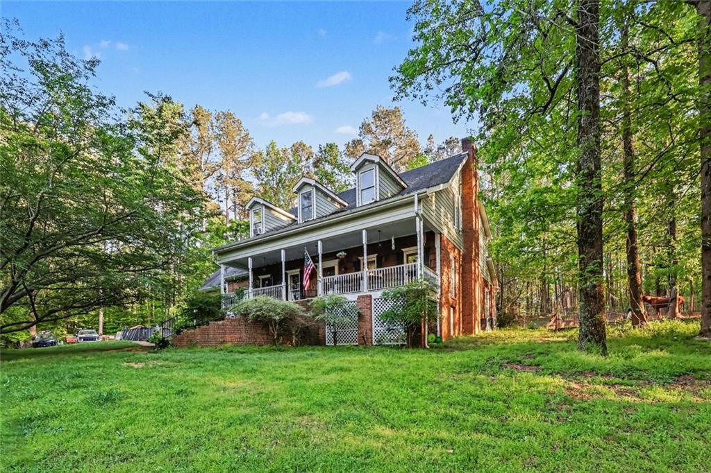 front view of a house with a garden