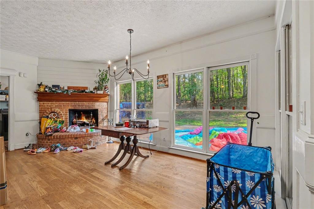 1940 Honey Creek Road Southwest Conyers, GA 30094 - Photo 11 of 31 a view of a livingroom with furniture window and outside view
