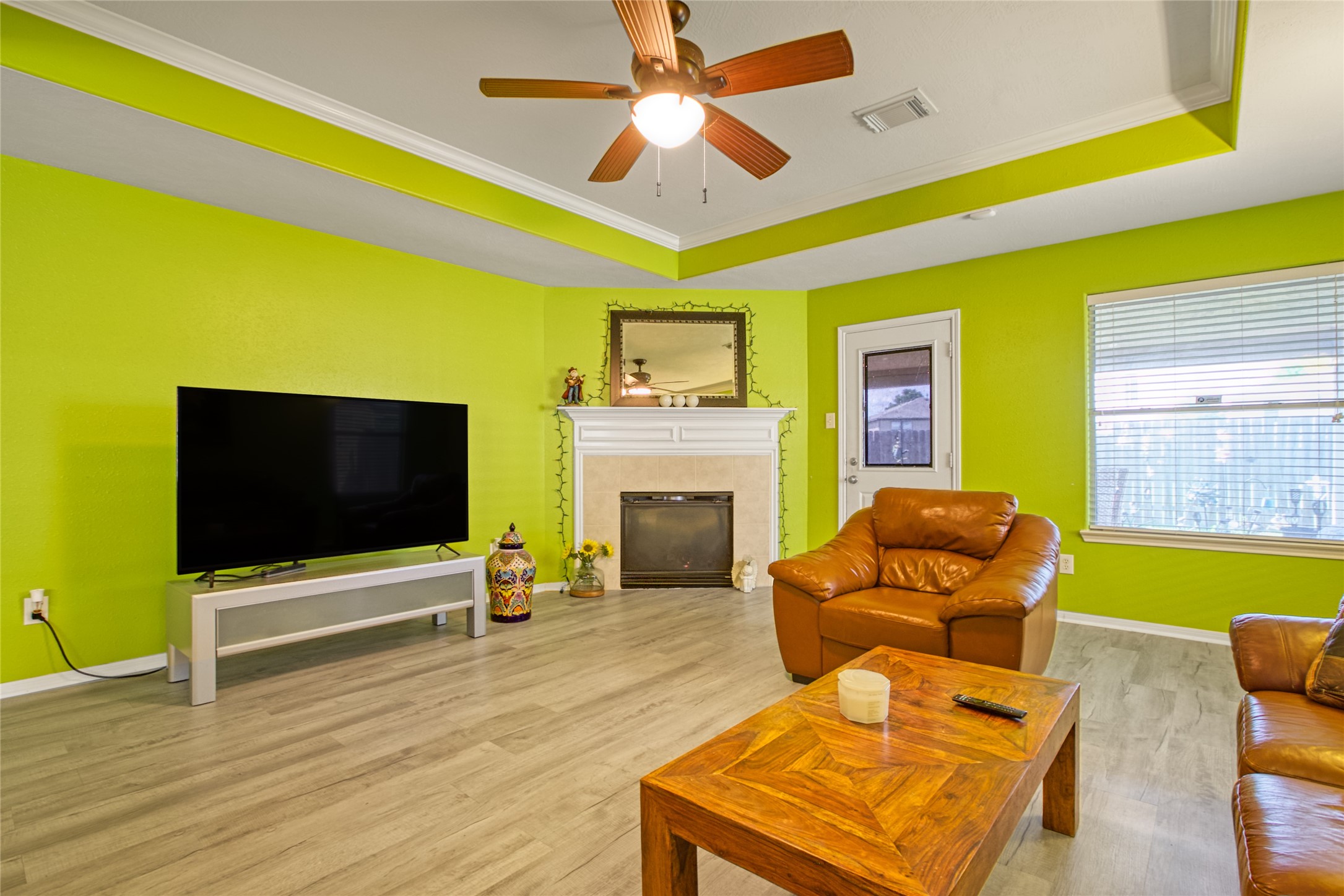 6702 Northridge Trace Lane Spring, TX 77379 - Photo 15 of 30 a living room with furniture and a flat screen tv