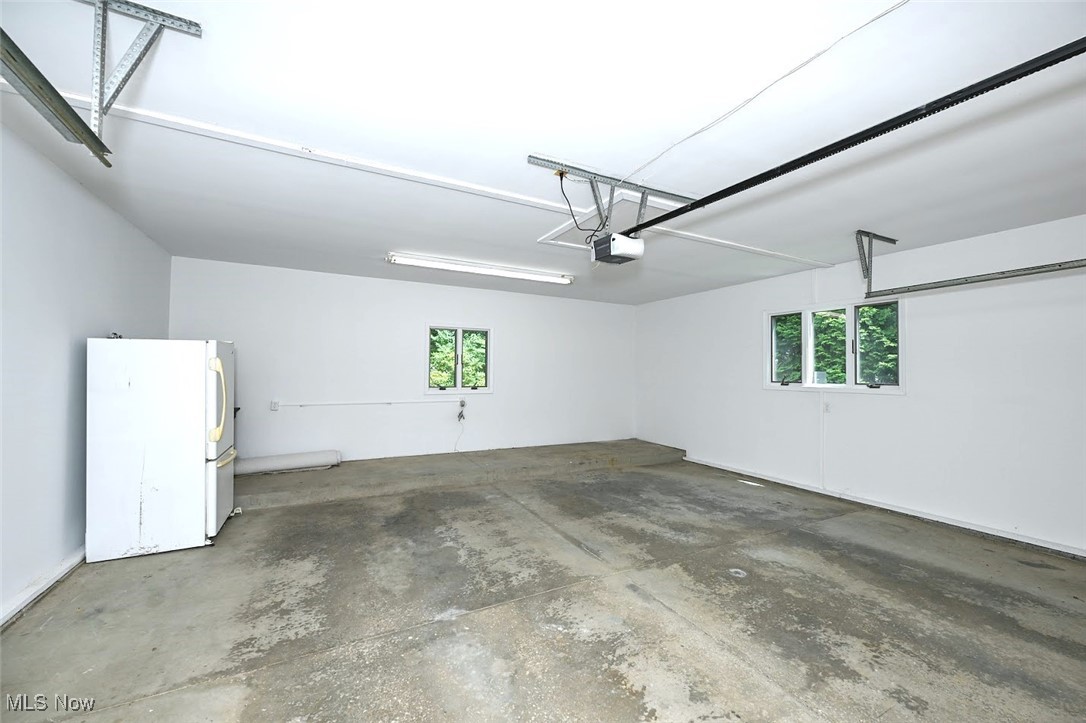 351 North Messner Road Akron, OH 44319 - Photo 35 of 44 *GARAGE W/OPENER & RAISED AREA BEHIND FOR BIKES! ~