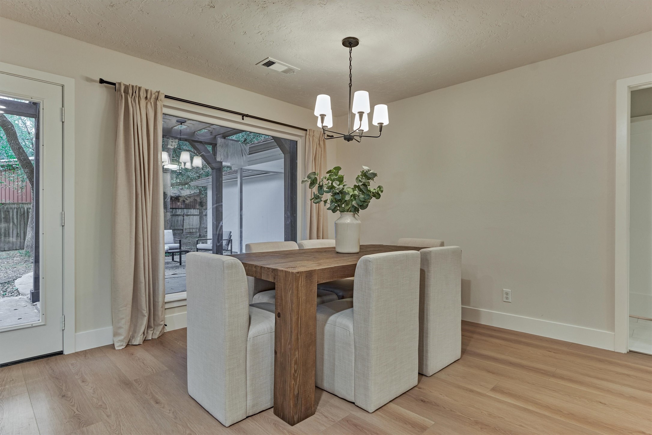 27286 Jimmy Lane Conroe, TX 77385 - Photo 16 of 50 Dining room is spacious and boasts tranquil views of the backyard with pergola!