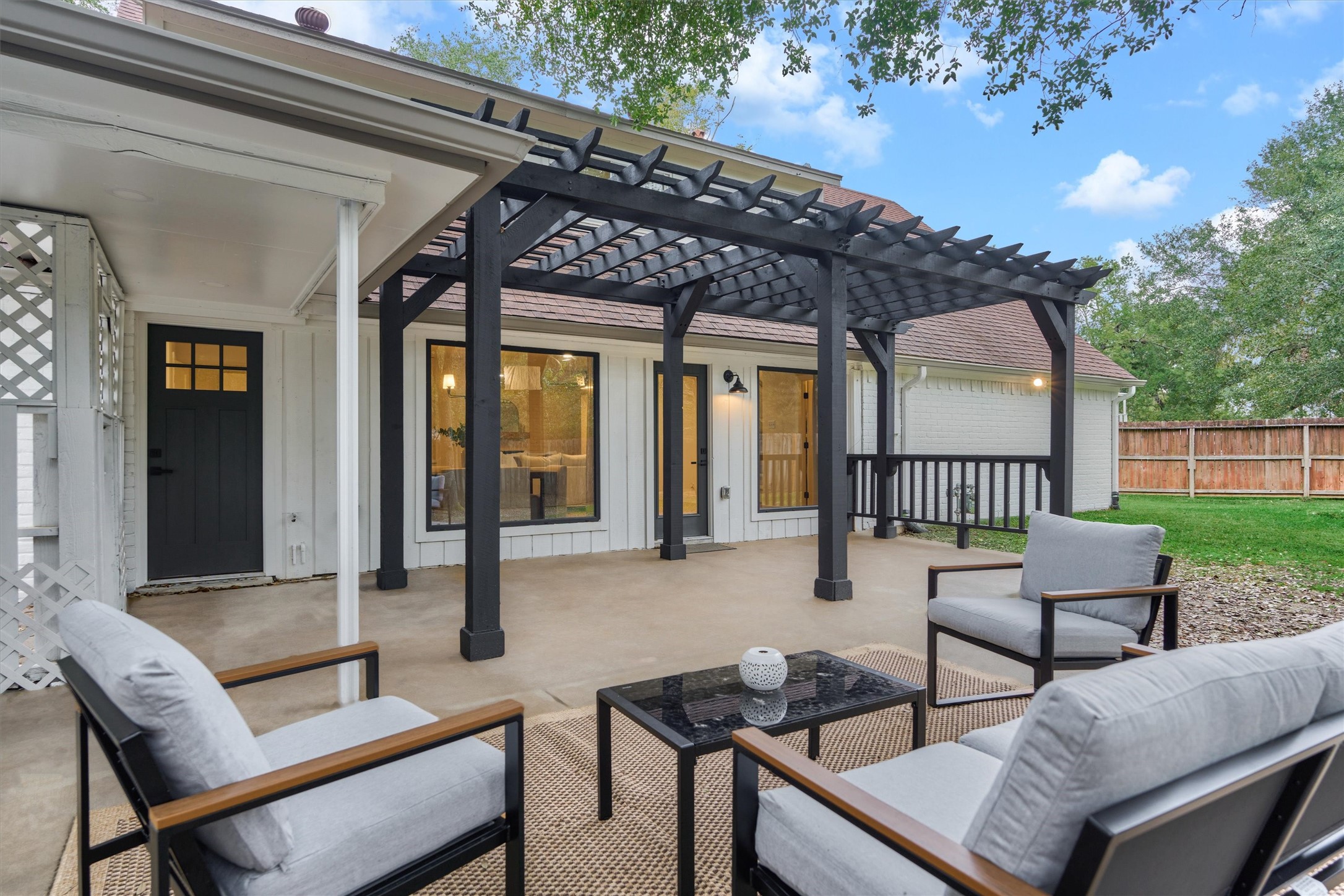 27286 Jimmy Lane Conroe, TX 77385 - Photo 2 of 50 Relax on your extended back patio with pergola and enjoy the peaceful surrounds of your private backyard.