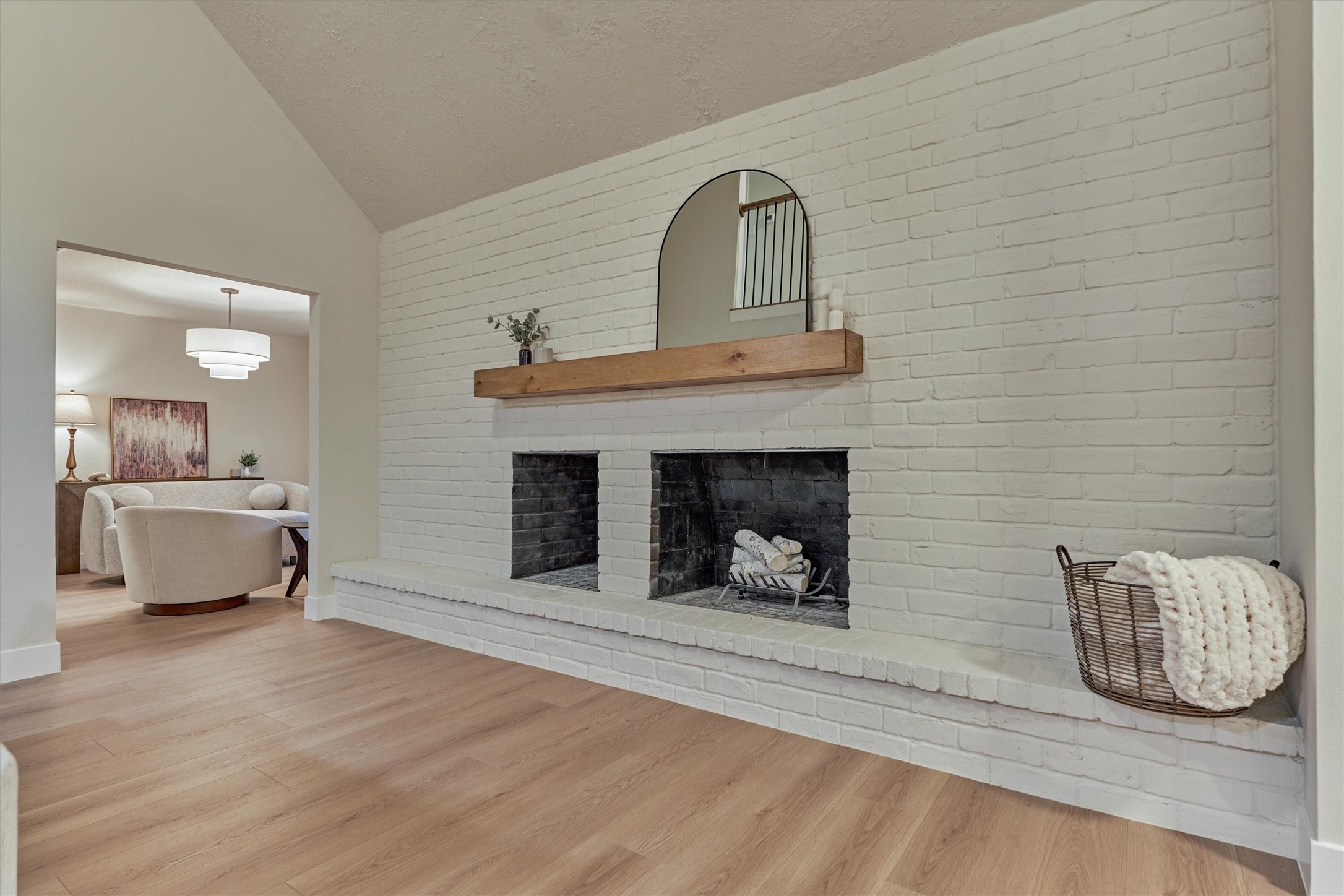 27286 Jimmy Lane Conroe, TX 77385 - Photo 21 of 50 This cozy den is a vision with its beautifully transformed interior. Note the convenient built-in space for storing firewood.