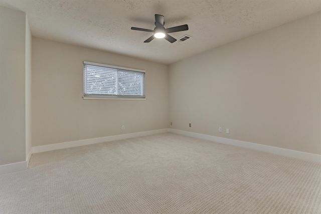 a view of a backyard with a garden