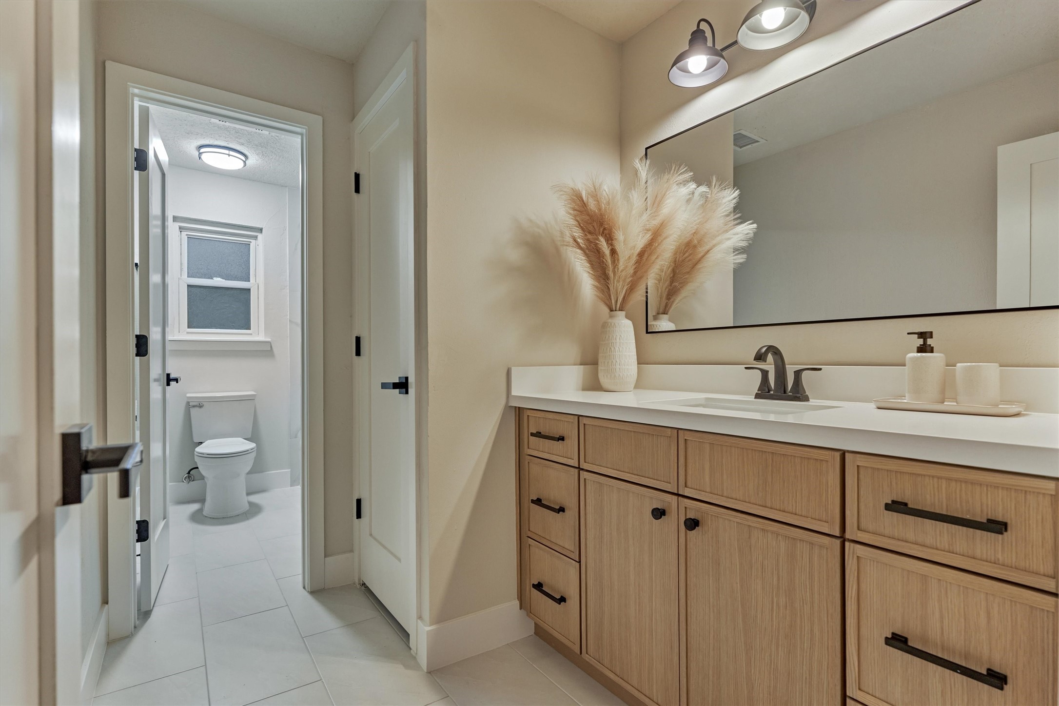 27286 Jimmy Lane Conroe, TX 77385 - Photo 32 of 50 Full secondary bathroom upstairs is transformed with designer finishes.