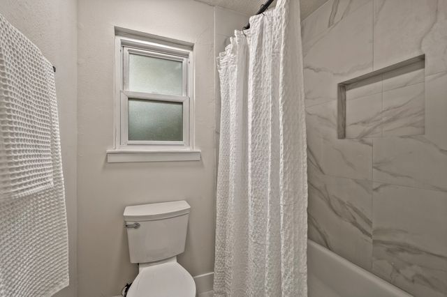 a view of a lake with a city