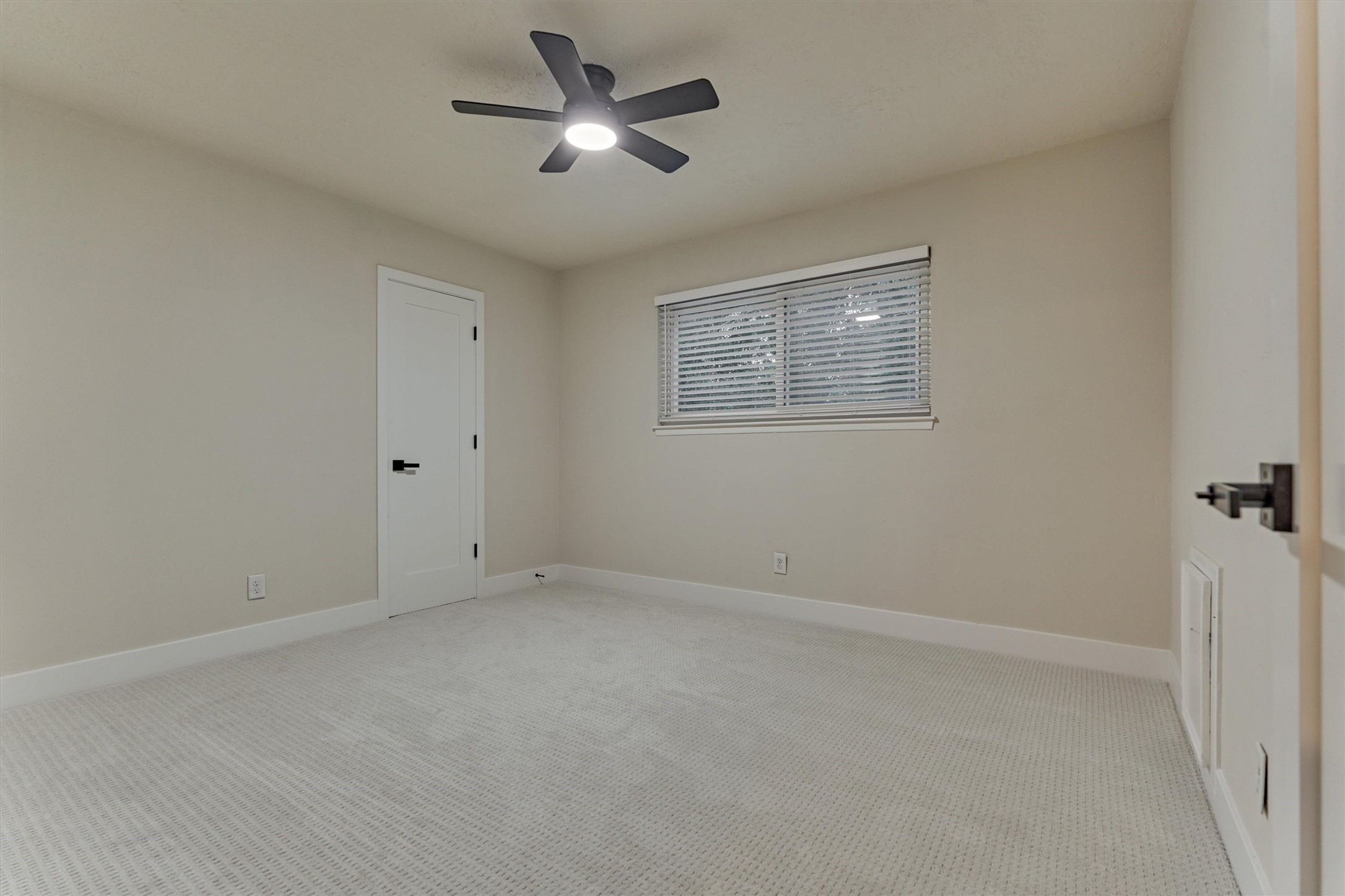 27286 Jimmy Lane Conroe, TX 77385 - Photo 35 of 50 So much space in this upstairs secondary bedroom #3 with closet, NEW carpet, and ceiling fan!