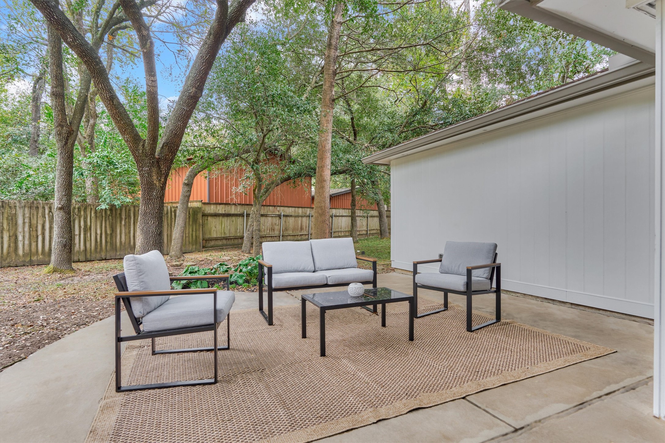 27286 Jimmy Lane Conroe, TX 77385 - Photo 39 of 50 Whether it’s morning coffee or an evening refreshment, this extended back patio is the perfect place to enjoy your surroundings in peace.