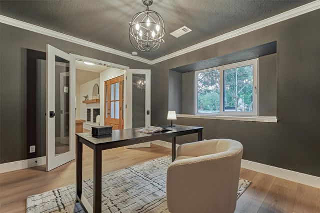 a view of a kitchen cabinets and a stove