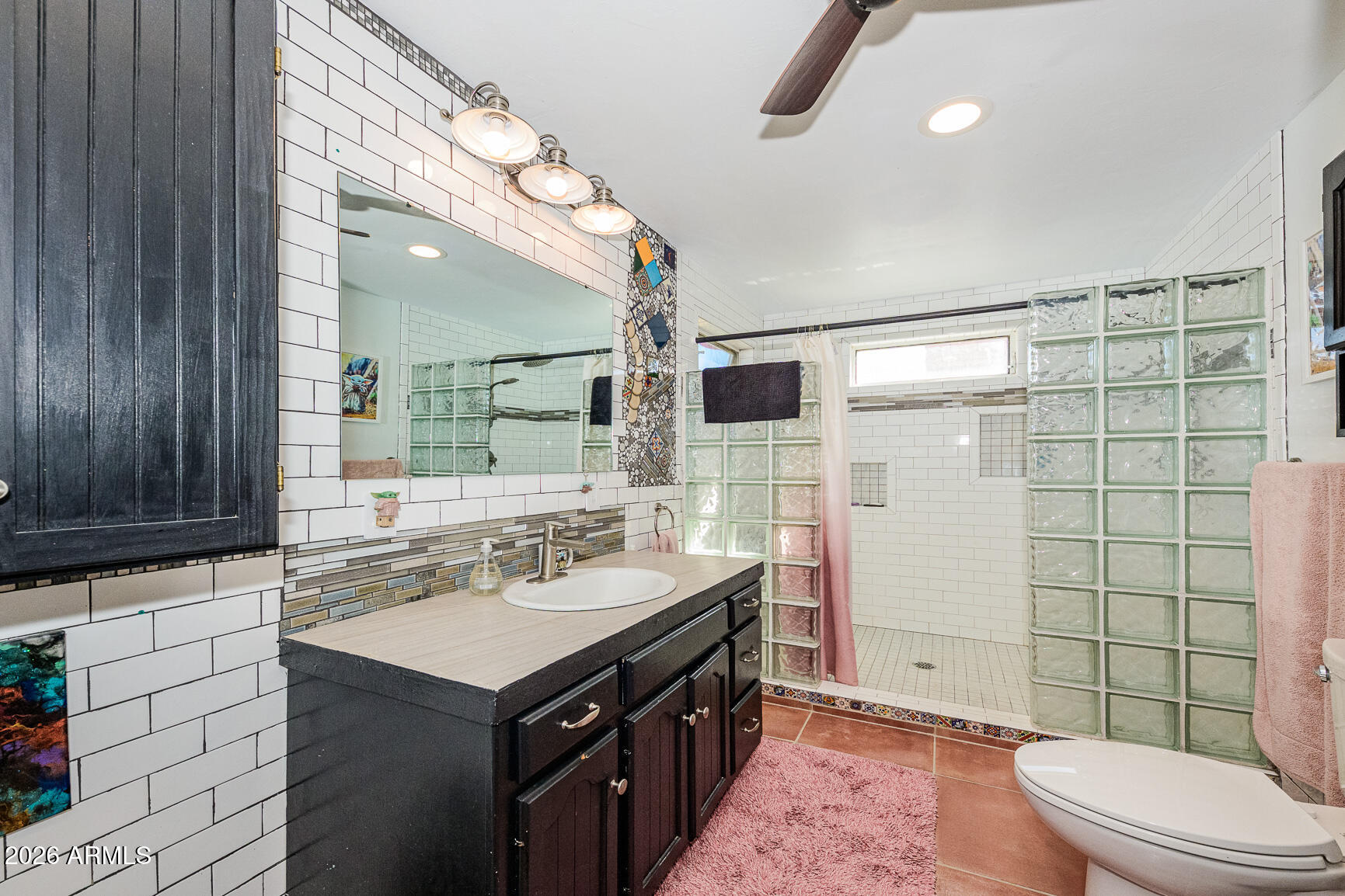 17 G Laundry Hill Road Bisbee, AZ 85603 - Photo 12 of 48 a bathroom with a sink a toilet and shower