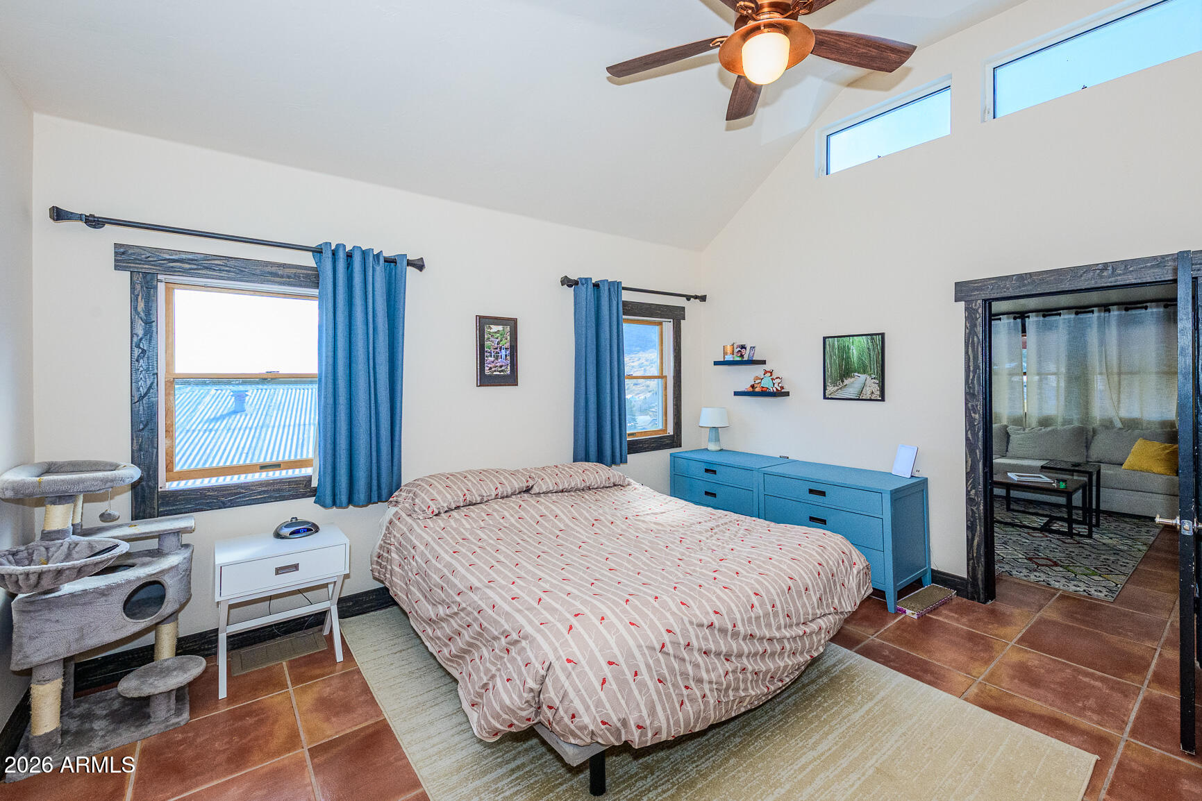 17 G Laundry Hill Road Bisbee, AZ 85603 - Photo 15 of 48 a bedroom with a bed and dresser with mirror
