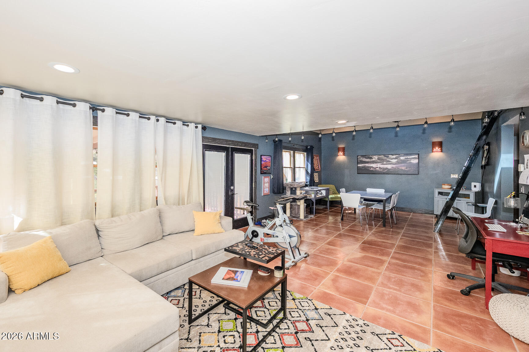 17 G Laundry Hill Road Bisbee, AZ 85603 - Photo 16 of 48 a living room with furniture and a large window