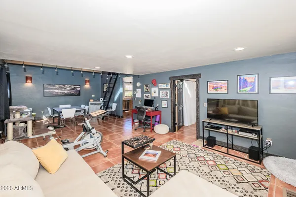 a view of a livingroom with furniture and window