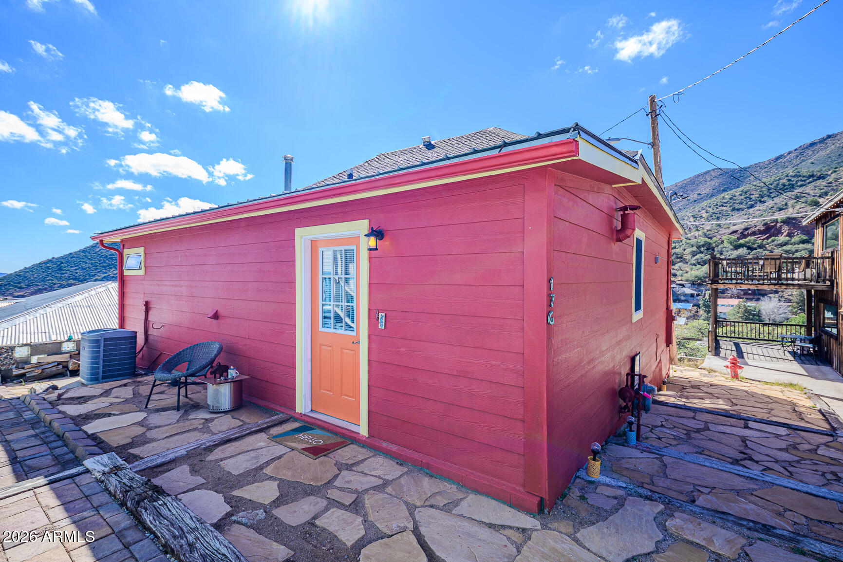 17 G Laundry Hill Road Bisbee, AZ 85603 - Photo 2 of 48 a front view of a house with a yard