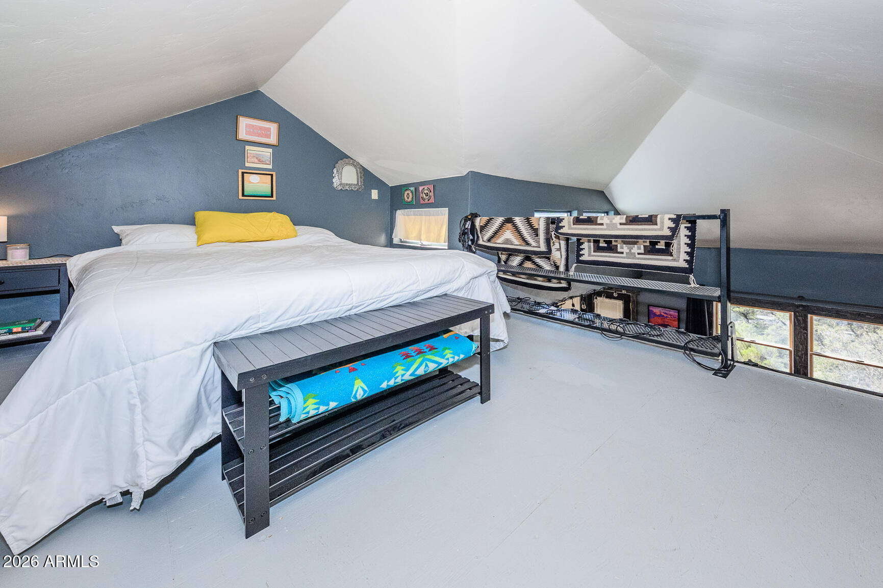 17 G Laundry Hill Road Bisbee, AZ 85603 - Photo 23 of 48 a bedroom with a bed and a night stand