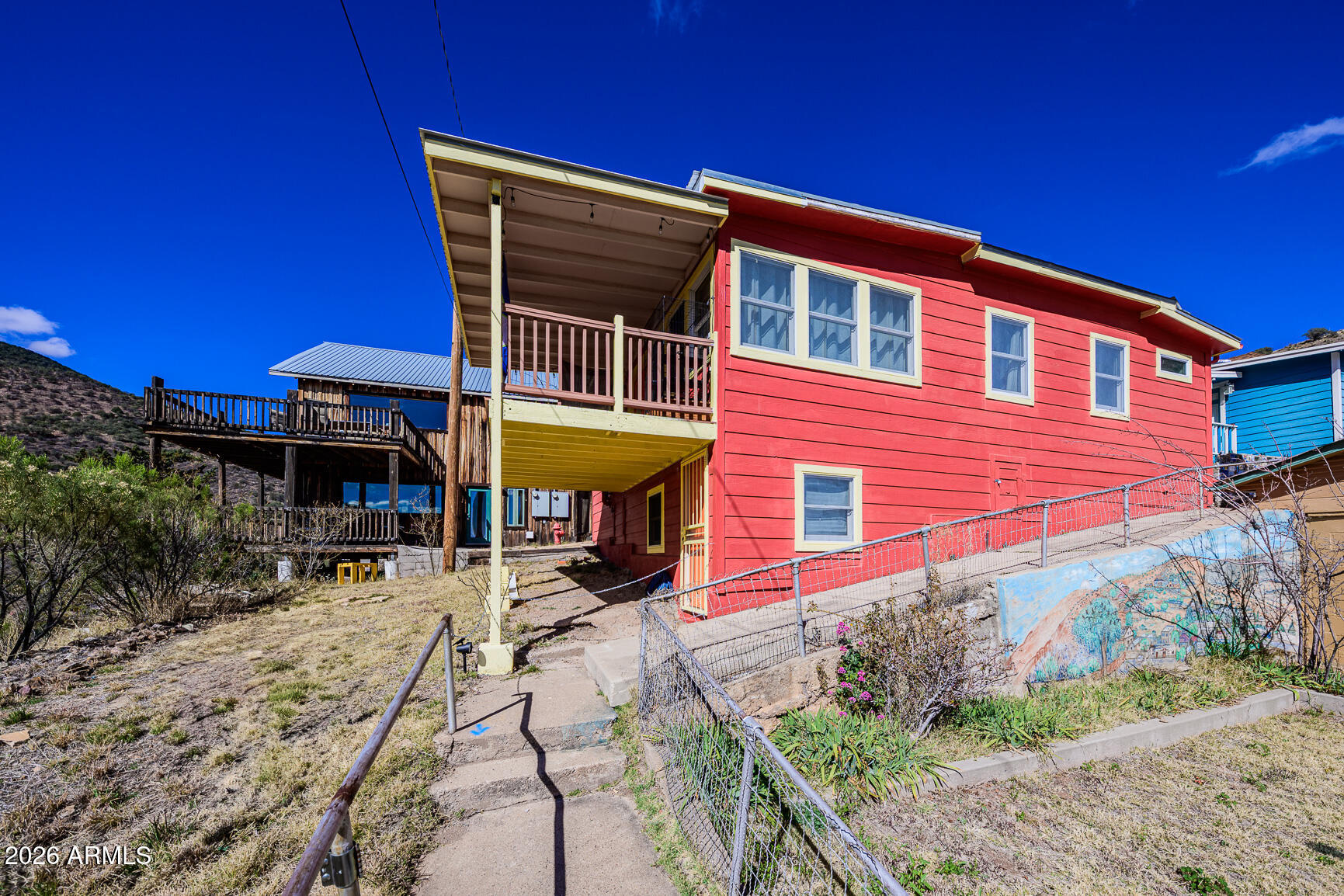 17 G Laundry Hill Road Bisbee, AZ 85603 - Photo 3 of 48 a backyard of a house with yard and outdoor seating