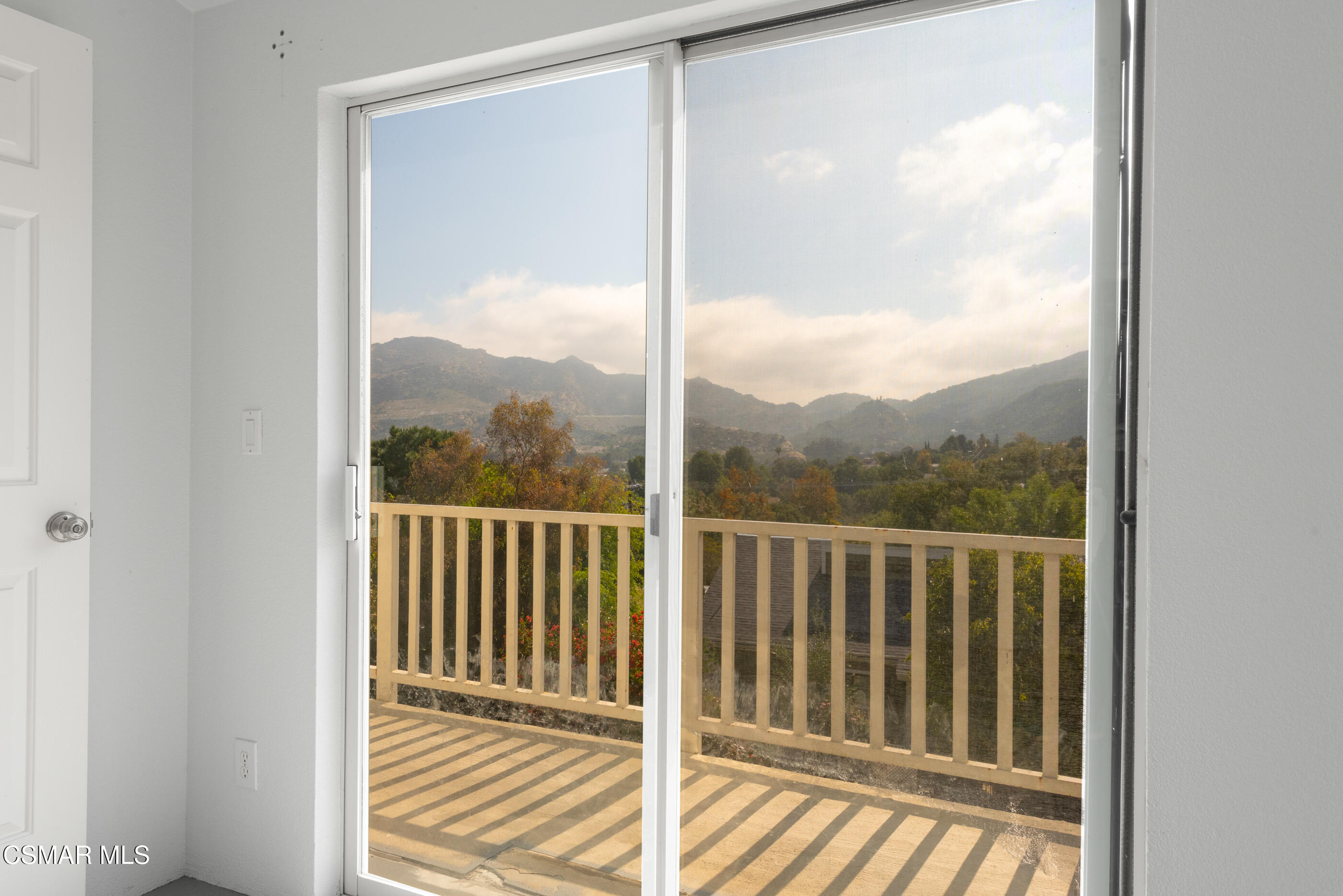 6079 Cedar Street Simi Valley, CA 93063 - Photo 12 of 31 a view of a wooden balcony