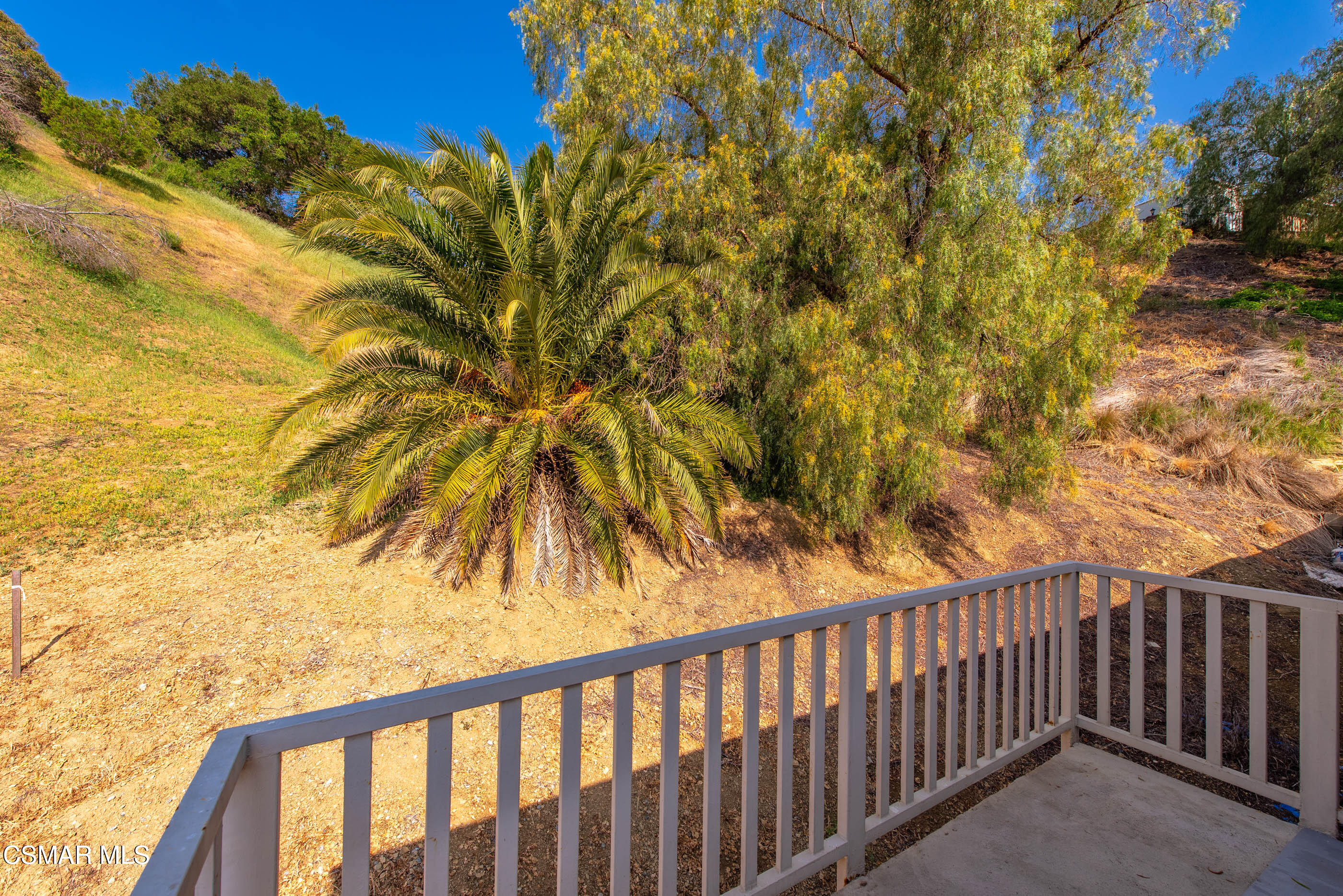 6079 Cedar Street Simi Valley, CA 93063 - Photo 23 of 31 a porch with a yard