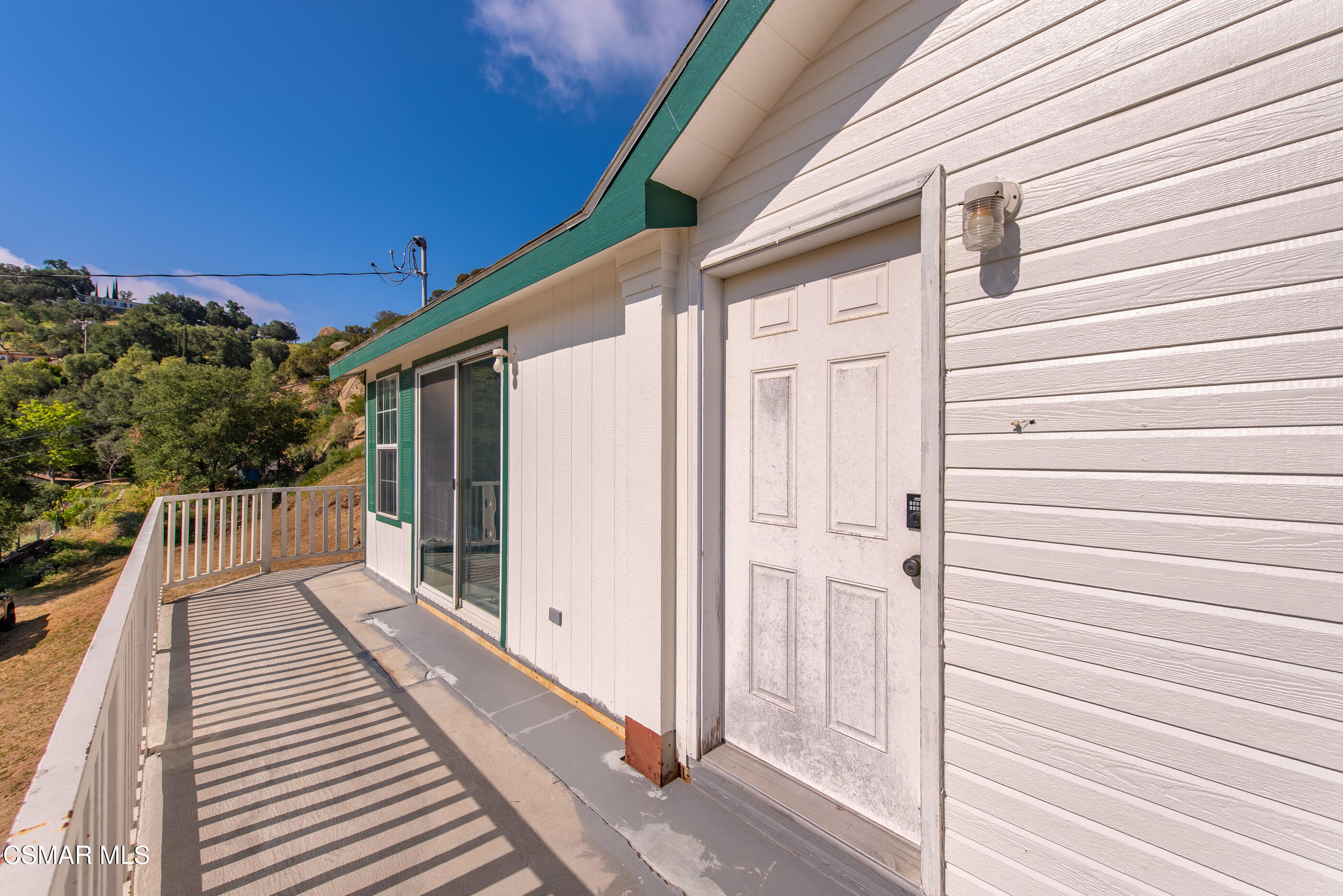 6079 Cedar Street Simi Valley, CA 93063 - Photo 25 of 31 a view of a balcony with wooden floor