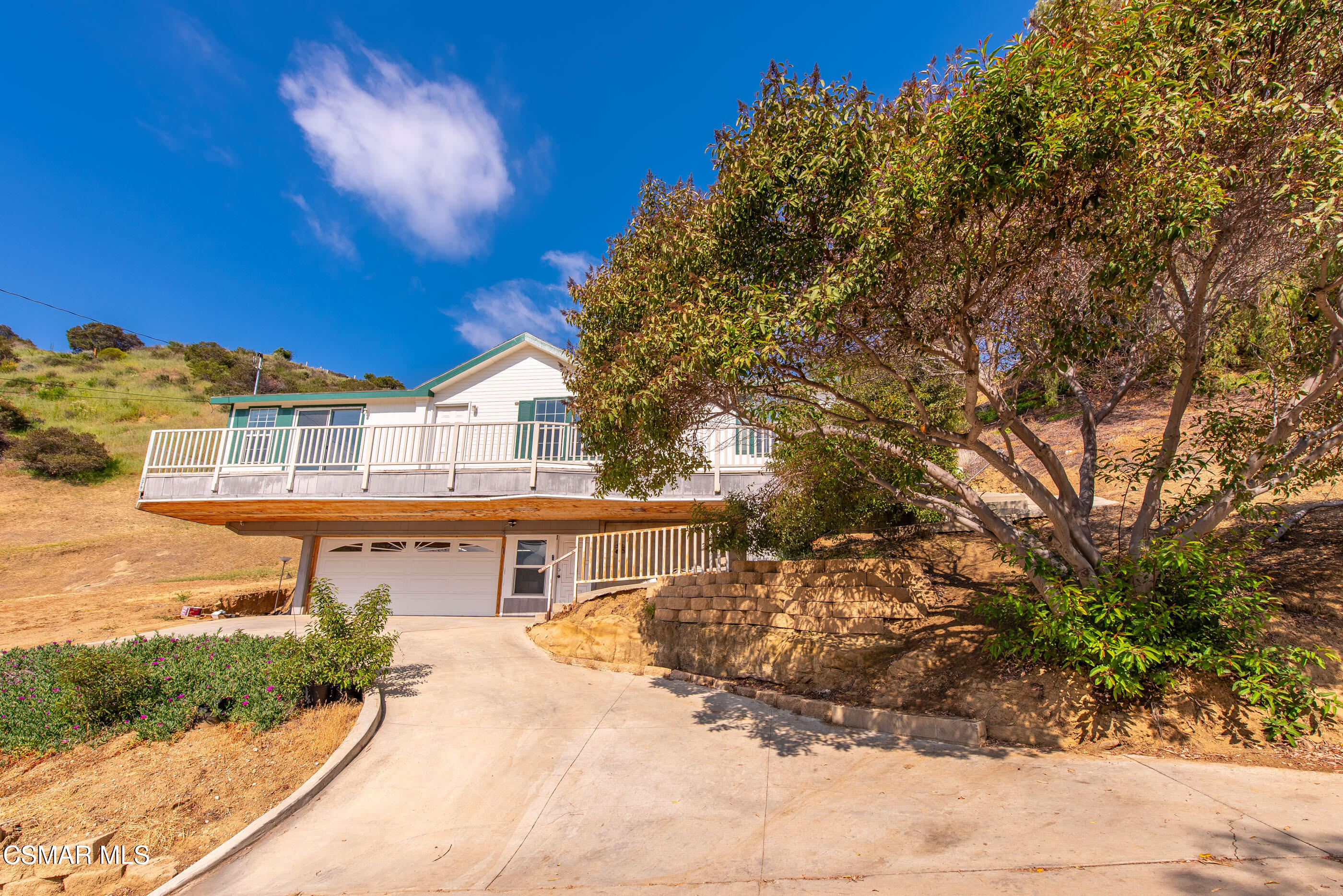 6079 Cedar Street Simi Valley, CA 93063 - Photo 27 of 31 a front view of a house with a yard