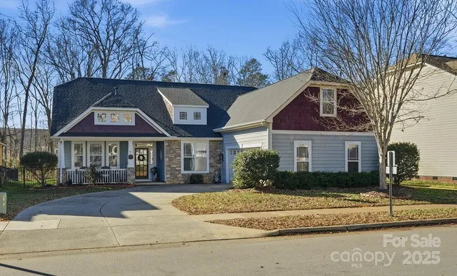 a front view of a house with a porch