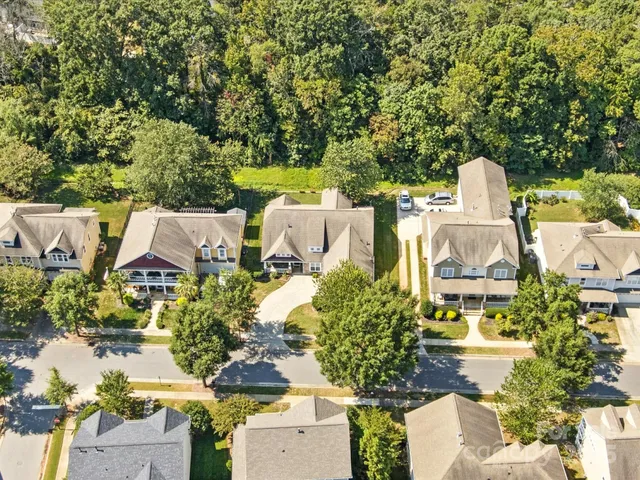 a view of swimming pool with a yard
