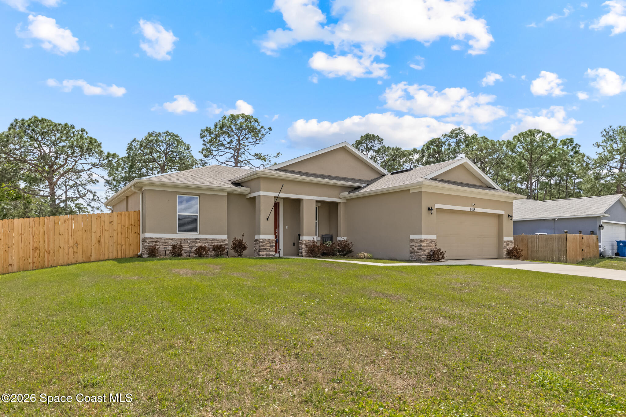 209 Wendover Road Southwest Palm Bay, FL 32908 - Photo 2 of 32 Front