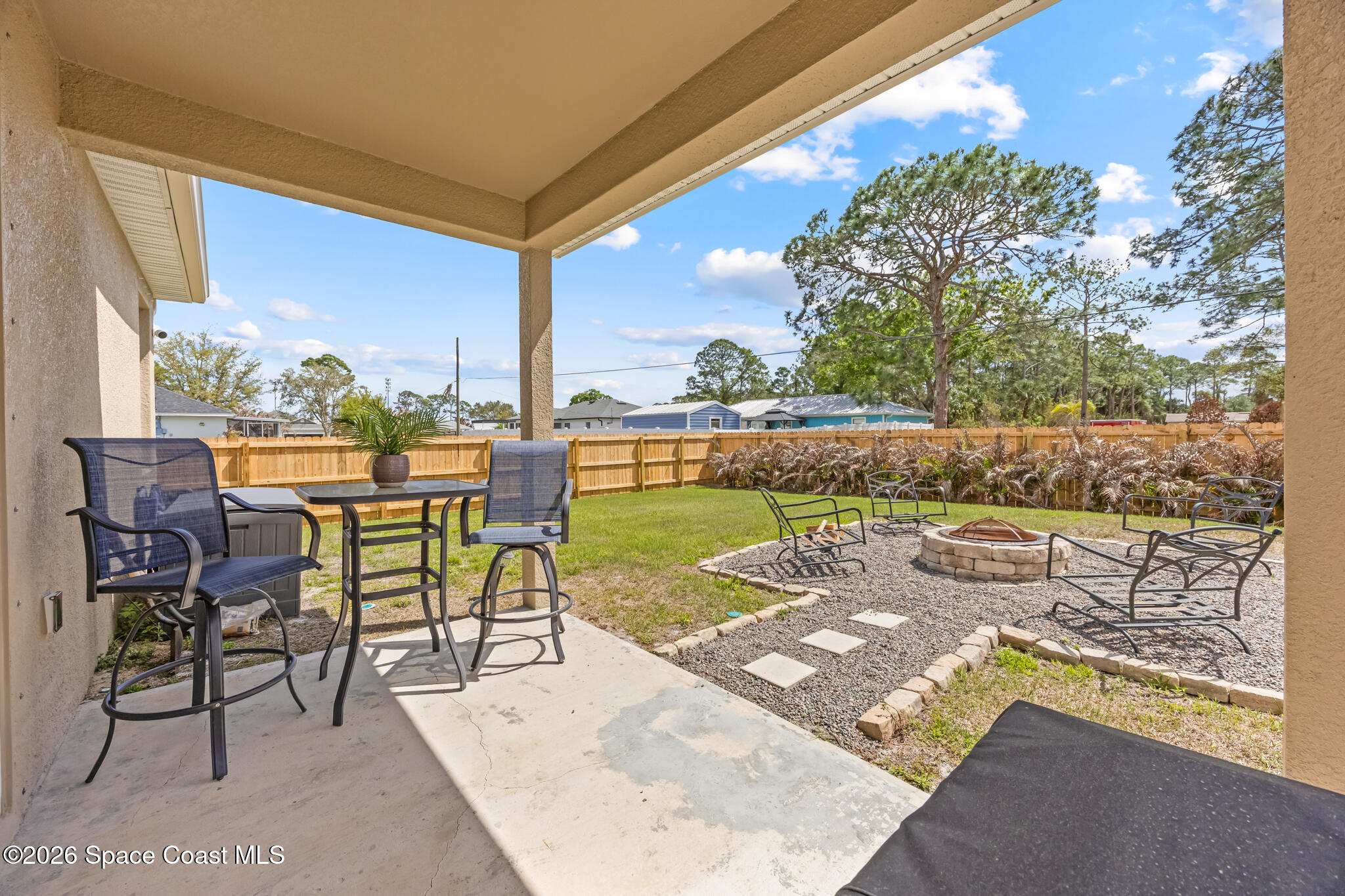 209 Wendover Road Southwest Palm Bay, FL 32908 - Photo 27 of 32 Covered Back Porch