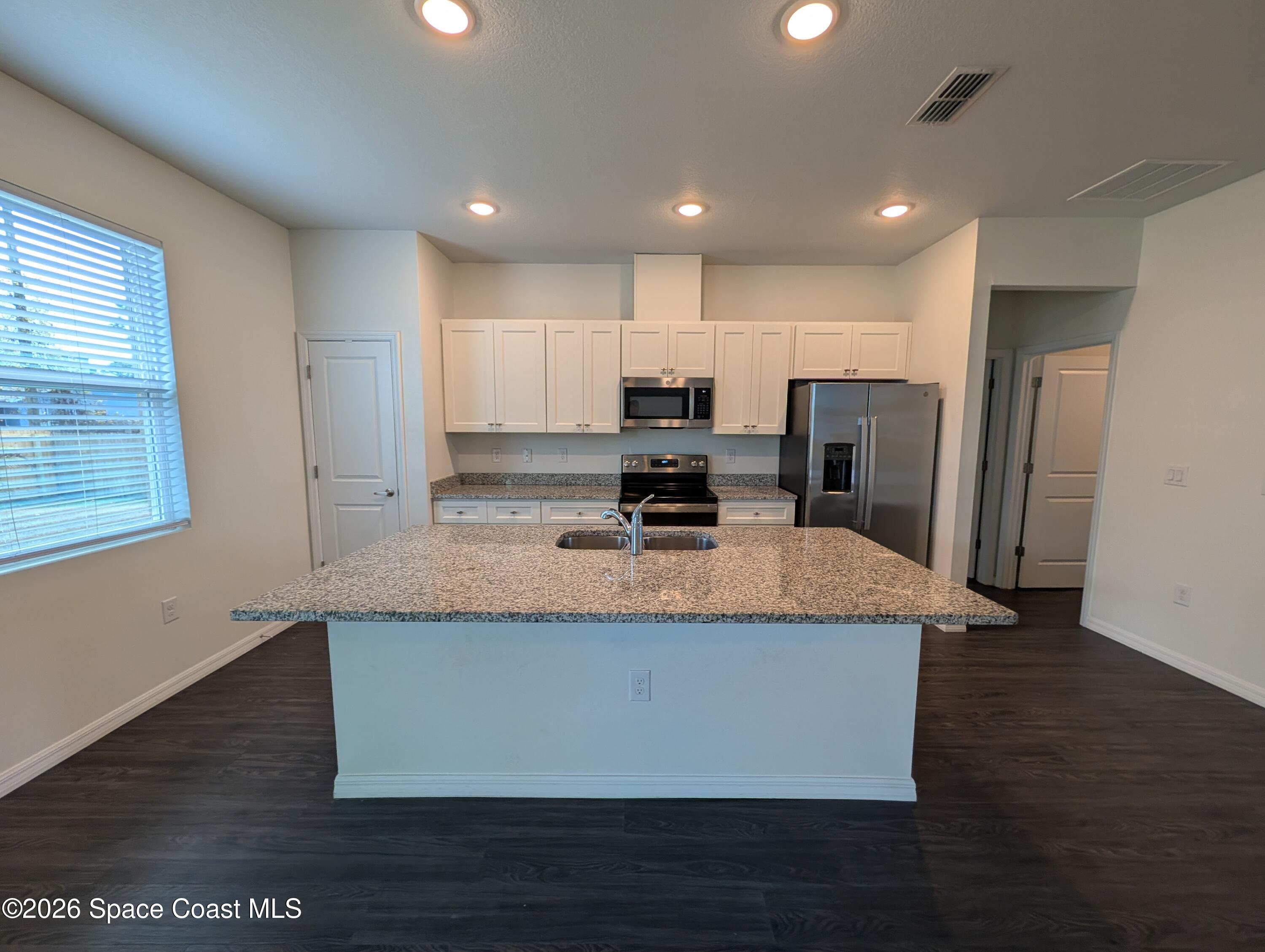 209 Wendover Road Southwest Palm Bay, FL 32908 - Photo 4 of 22 Kitchen Island