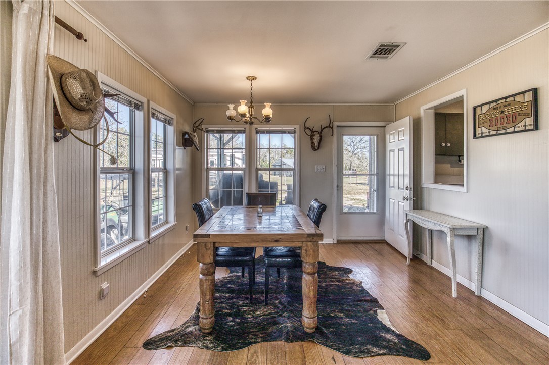 9354 Farm To Market 2780 Burton, TX 77835 - Photo 11 of 43 a view of a livingroom with furniture window and wooden floor