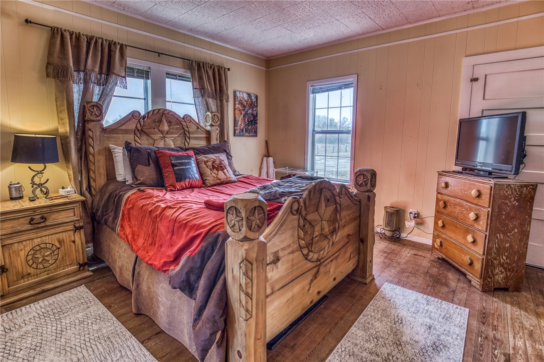 9354 Farm To Market 2780 Burton, TX 77835 - Photo 17 of 43 a bed room with a bed and a tv