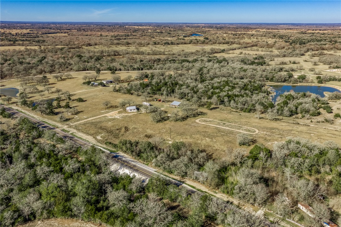 9354 Farm To Market 2780 Burton, TX 77835 - Photo 40 of 43 a view of a large yard with lots of trees