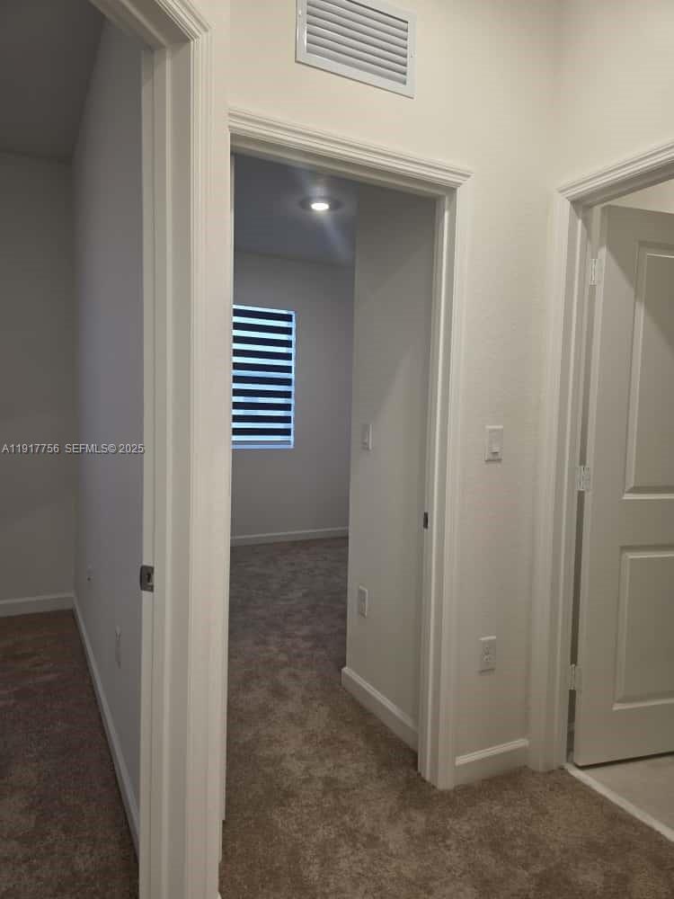 17875 Southwest 359 Terrace Homestead, FL 33034 - Photo 13 of 20 a view of a hallway with closet area
