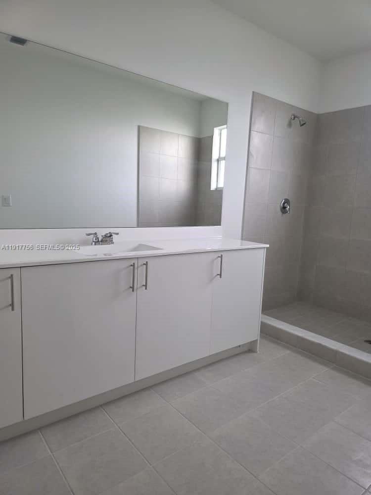 17875 Southwest 359 Terrace Homestead, FL 33034 - Photo 15 of 20 a bathroom with a sink and mirror